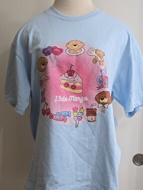 Light Blue Graphic Tee with Sweet Treats/Size XL/13De Marzo